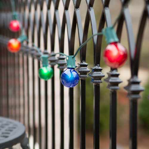 25' Commercial Multicolor Satin Patio String Light Set with 25 G50 Bulbs on Green Wire, E17 Base
