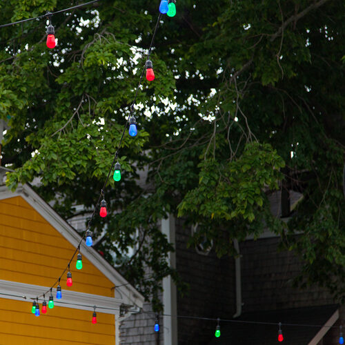 54' Commercial Multicolor LED Patio String Light Set with 24 S14 Bulbs on Black Wire, with Drops